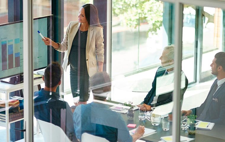 5 business people in a meeting