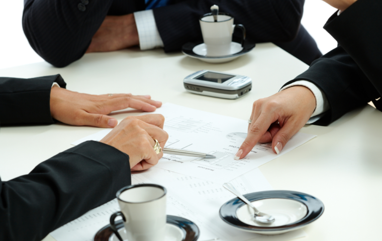 Hands Pointing Business Chart