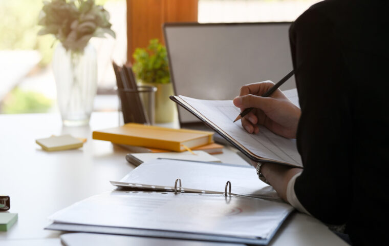 I Stock Business Angel Funding business professional writiing critria on paper list