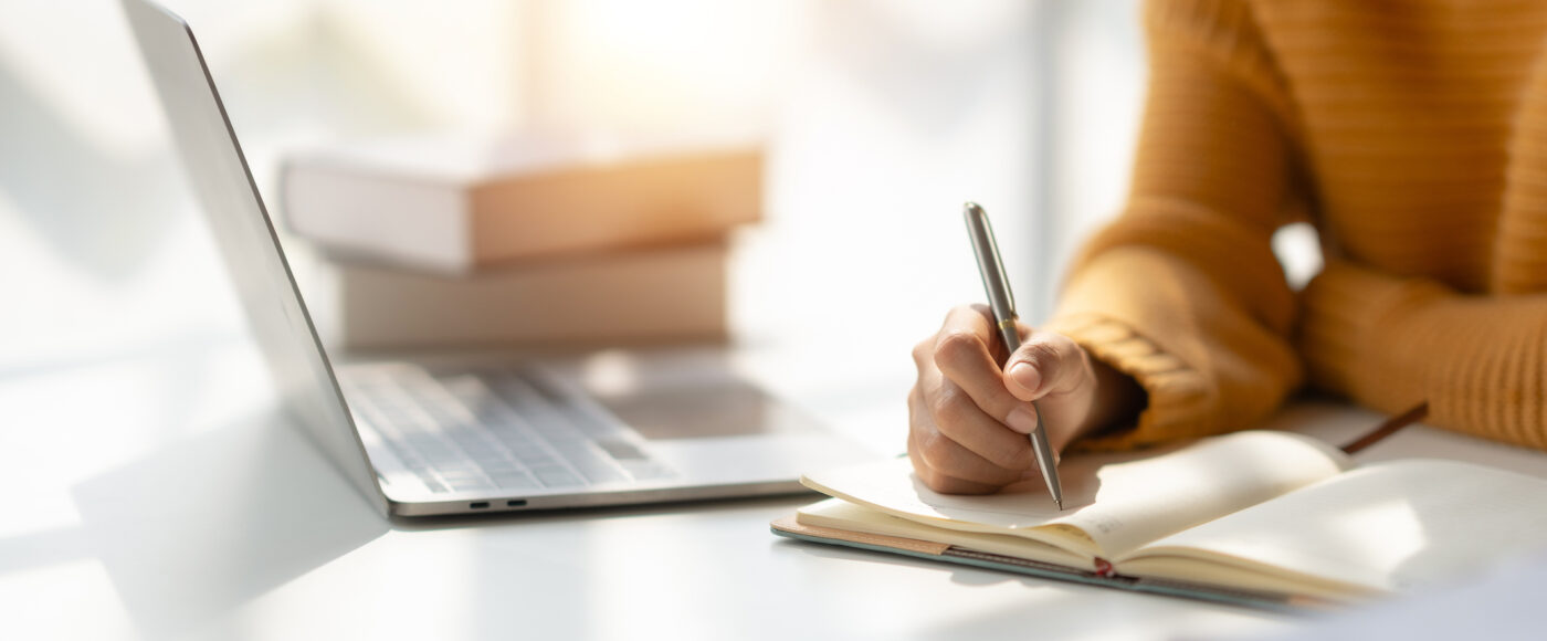 I Stock Business explorer EXPLORER Business professional writing a list