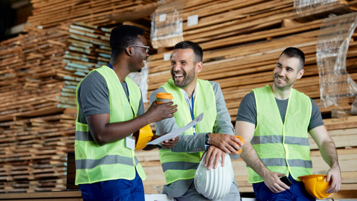 I Stock First Time Exporters 3 smiling warehourse workers drinking coffee