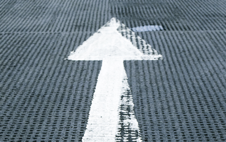 Image of small white arrow pointing up