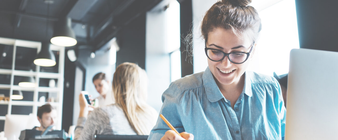 I Stock Trade Export Pathway person smiling focusing on work