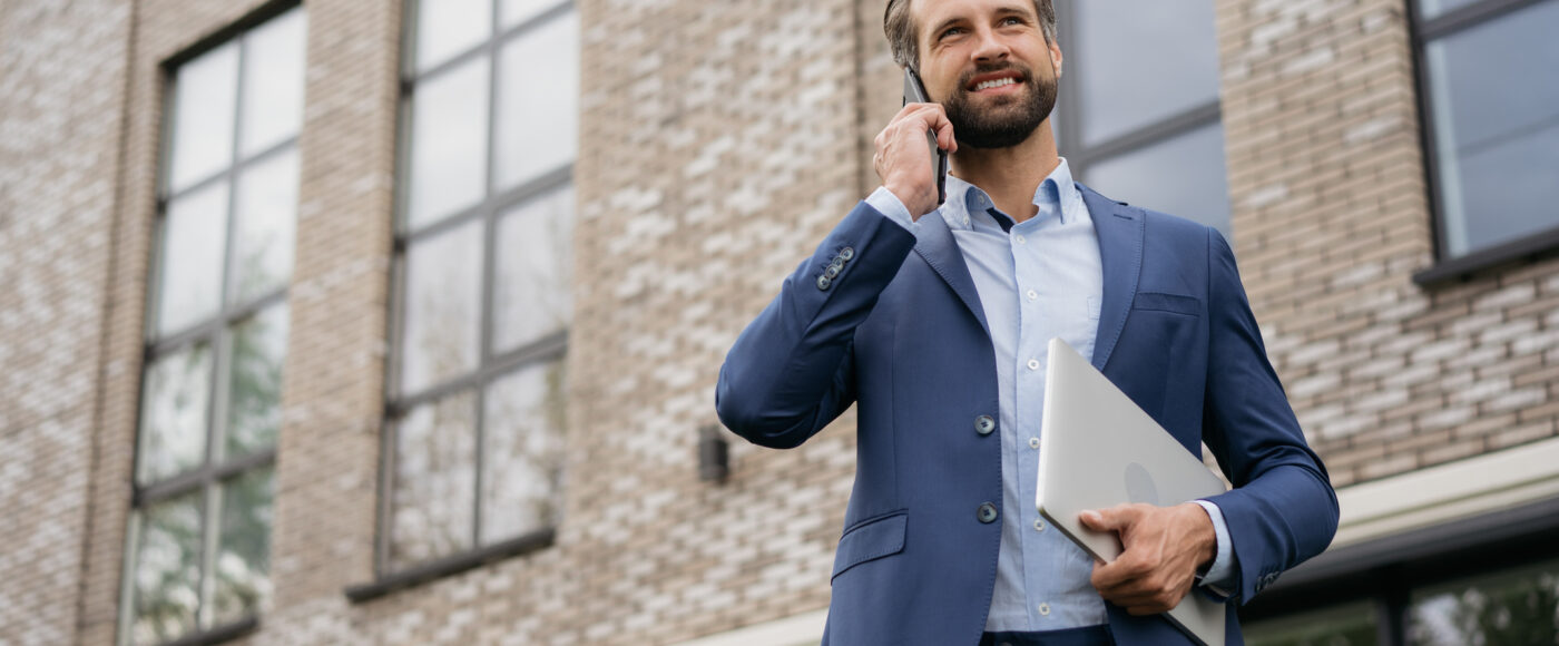 Istock Become a Business angel business professional wearing suit talking on phone in street