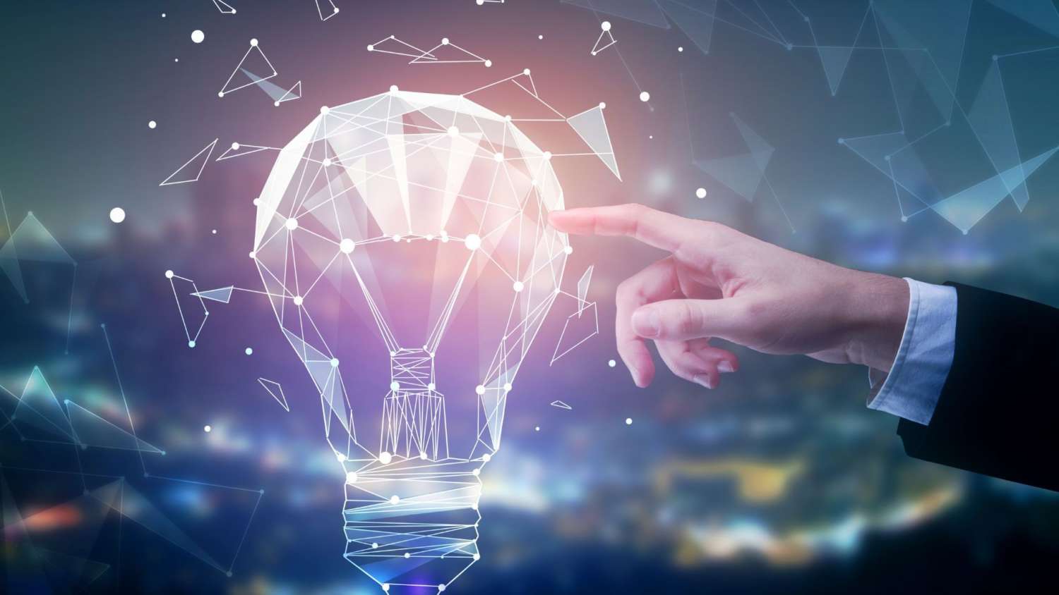 Digital image of hand touching a lightbulb