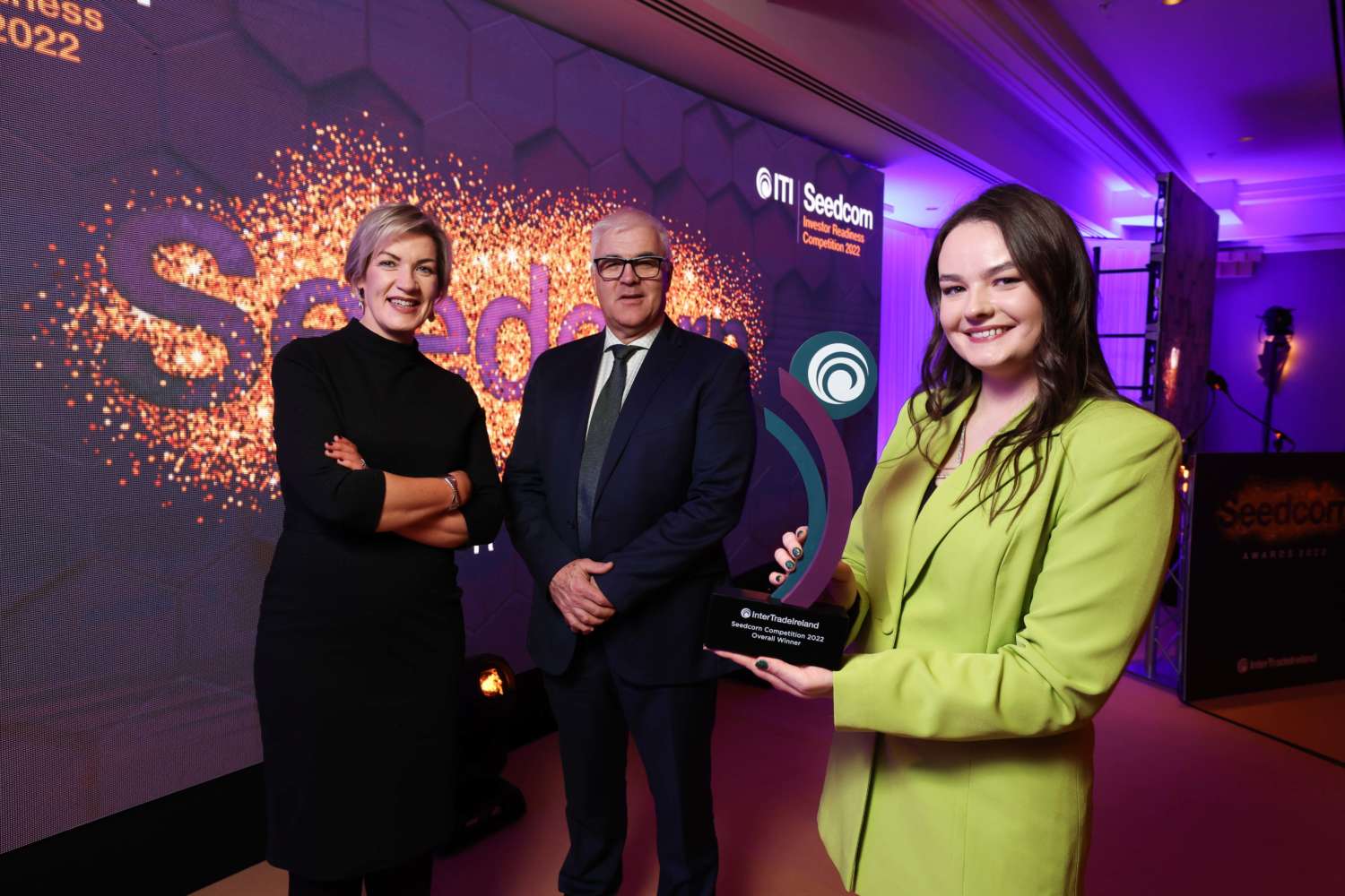 Eibhlin O Riordan co founder of Byo Wave holding Seedcorn overall winner award alongside Margaret Hearty and Richard Kennedy